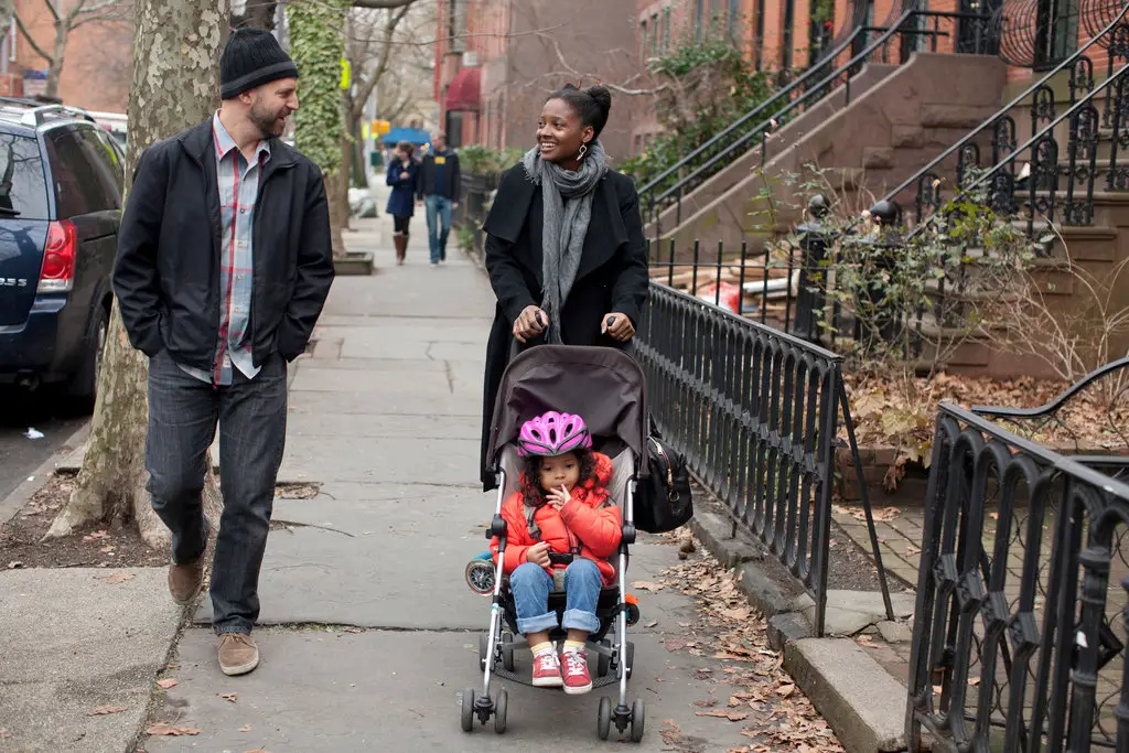 Happily married husband and wife: Raphael Allison and Tracy K. Smith living happily with kids